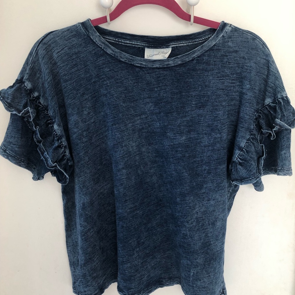 Blue Denim colored/cotton blend top with ruffled sleeves. Size Medium